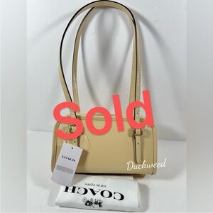 Coach Swing Zip Bag 20 in Brass/Moonlight Crinkle Patent Leather NWT